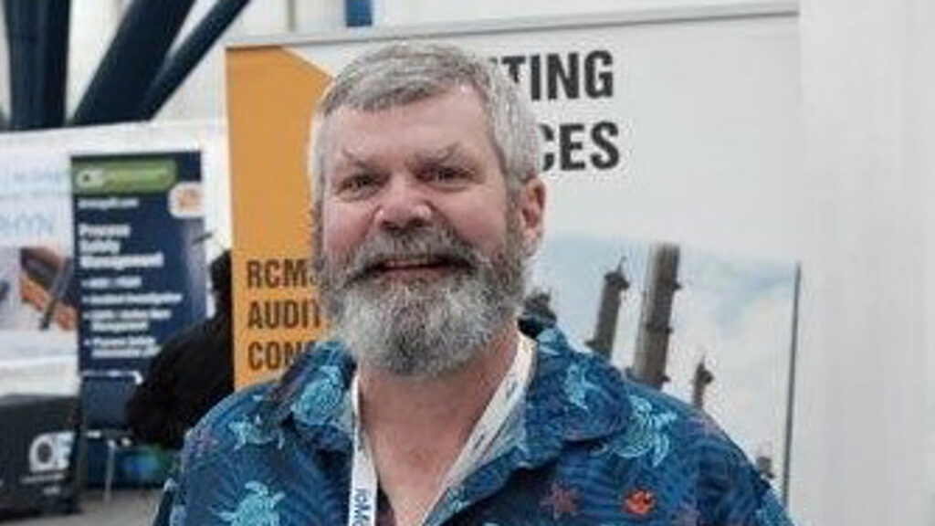portrait of Dan Devine of Midland Engineering Ltd. Smiling.